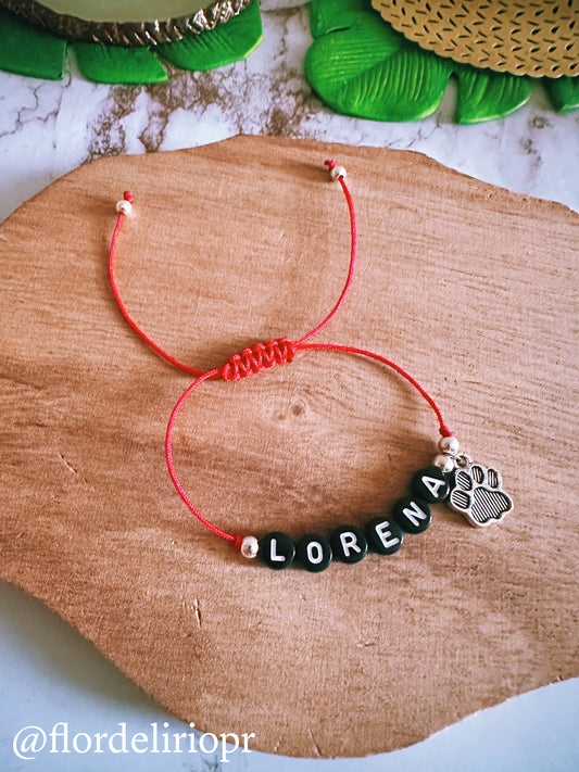 Red nylon paw and pet name bracelet